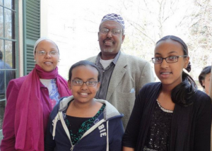 Samira Ibrahim, far right, 2012 First Place Essay Contest winner, 8th grade, St. Mary of the Hills School, Milton, with her parents, Abdirahman Ibrahim and Khadra Ali, and sister, Bayden Ibrahim