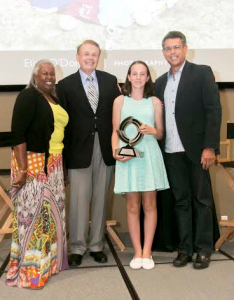 Eliza receiving the award with Sharon Robinson, Dr. Larry Thompson (President of Ringling) and Rich Kaplan (VP of Marketing and Innovative Partnerships) - photo by Karen Arango