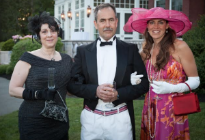 Winter Wonderland Gala event co-chairs, Carla Morey, at left, and Georgia Lee, with Tony Will at the FHM Downton Abbey Ball held on 17 May 2014.