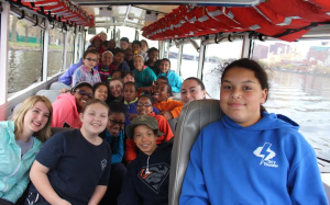 The 6th grade class and chaperones ride the duck tours at Sydney Joseph of Randolph has a turn to drive!