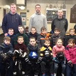 Dave Finn, Christian Leimkuehler, and Kevin Doyle with a group of budding young skaters.