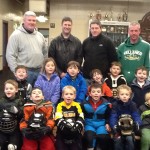 John Kelly, Allen Schweitzer, Glen Hoffman, and Peter Mullen with a group of aspiring skaters.