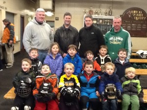 John Kelly, Allen Schweitzer, Glen Hoffman, and Peter Mullen with a group of aspiring skaters.