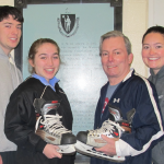 Bob Sweeney, Program Director, is flanked by his nieces Danielle Dumais and  Kate Sweeney-Reagan and nephew Brad Dumais - the 3rd generation of Sweeney's volunteering in MYH's Learn to Skate Program.