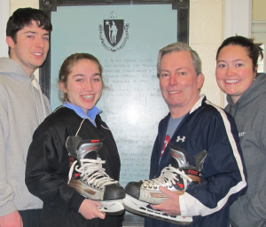 Bob Sweeney, Program Director, is flanked by his nieces Danielle Dumais and  Kate Sweeney-Reagan and nephew Brad Dumais - the 3rd generation of Sweeney's volunteering in MYH's Learn to Skate Program.