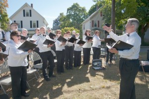 The Quincy Choral Society performed several pieces throughout the Crane Field Dedication Ceremony.