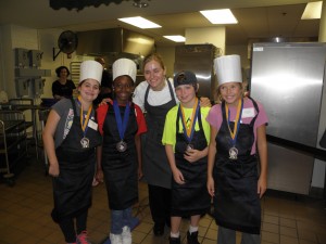 Smiles, hats, and aprons!