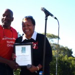 Elizabeth Thomas with MC Rev Slaughter