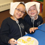 Olivia Desnoyer and Ashley Hubbard enjoy their Thanksgiving meal!