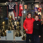 5th graders Alexandria Wright and Jamie Fulton stand proudly with the Pariots Super Bowl Trophies