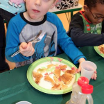 Pre-K student, Finn Harris (Milton) enjoys his pancakes!